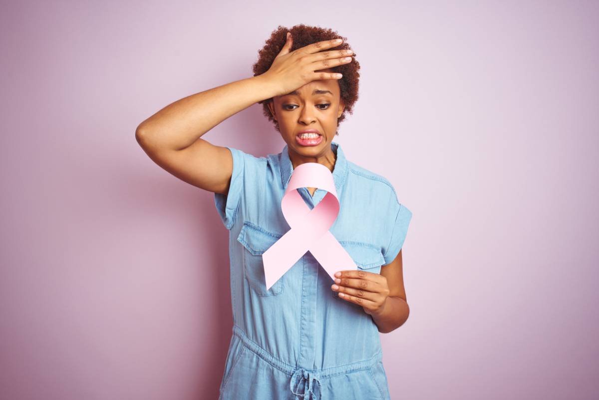 Woman feeling post-mammogram anxiety.