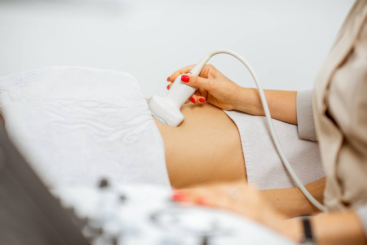 Woman having a pelvic ultrasound.